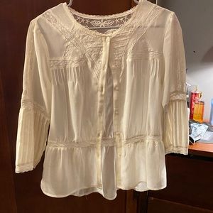 This beautiful white/see-through shirt